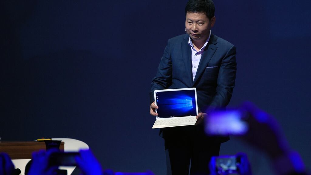 Huawei’s CEO Richard Yu presents MateBook and its accessories at the Mobile World Congress in Barcelona in February 2016. Photograph: Lluis Gene/AFP/Getty Images