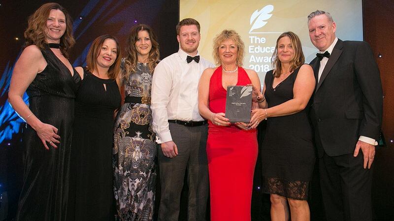 Dr. Teresa Hurley Former Head of School of Management, DIT presents the Best Further Education Provider Award to CMIT Team.