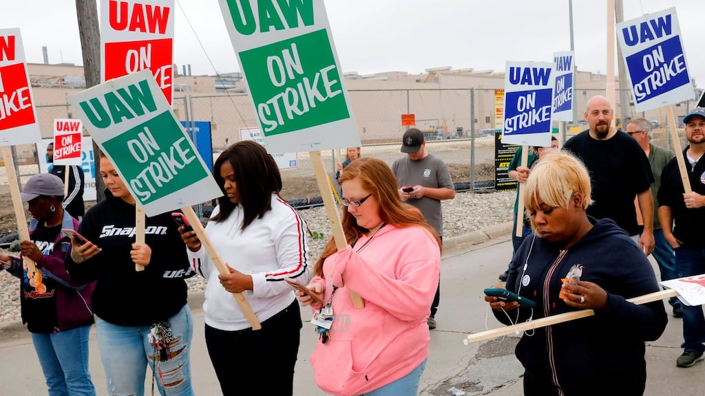 Members of the United Auto Workers picket the GM in Flint, Michigan. Photograph: Jeff Kowalsky/AFP/Getty Images