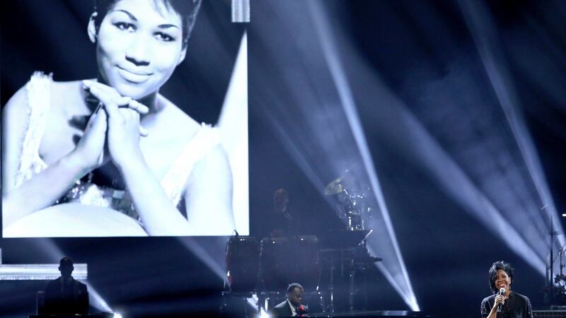 Gladys Knight performs “Amazing Grace” during a tribute to the late singer Aretha Franklin, pictured on screen, at the American Music Awards in LOs Angeles. Photograph: Matt Sayles/Invision/AP