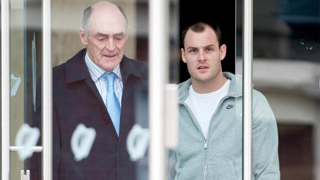 Solicitor Michael Staines and Celtic and Republic of Ireland footballer Anthony Stokes at Dublin District Court today. Photograph: Collins Courts.