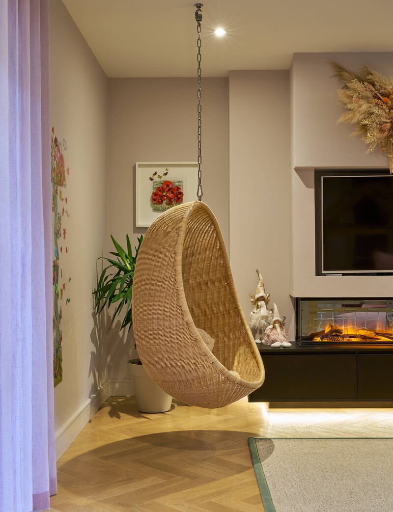 A hanging egg chair has been a hit with the children in the playroom. Photograph: Gareth Byrne