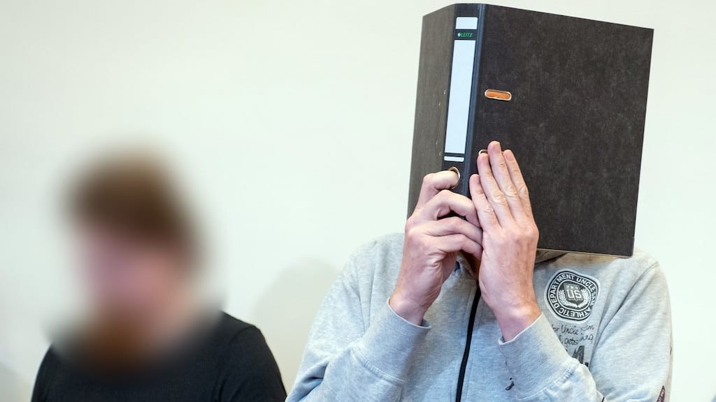 Defendants Mario S and Andreas V arrive for their trial at the district court in Detmold, northwestern Germany, on Thursday.   Photograph: Bernd Thissen/AFP/Getty Images