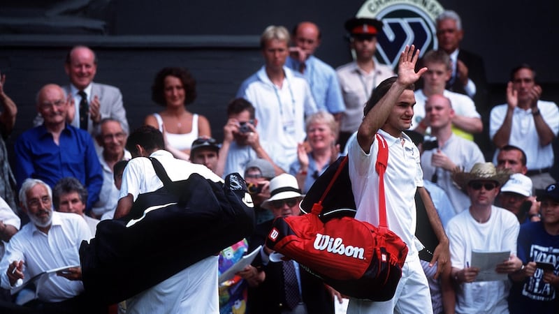 Roger Federer after beating Pete Sampras aged 19 in 2001. Photograph: Clive Brunskill/Getty