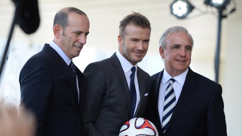 Beckham with Garber (left) and Gimenez (right). Photo: Uri Schanker/WireImage