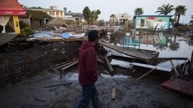 Chile earthquake: Aftershocks and powerful waves hit coast