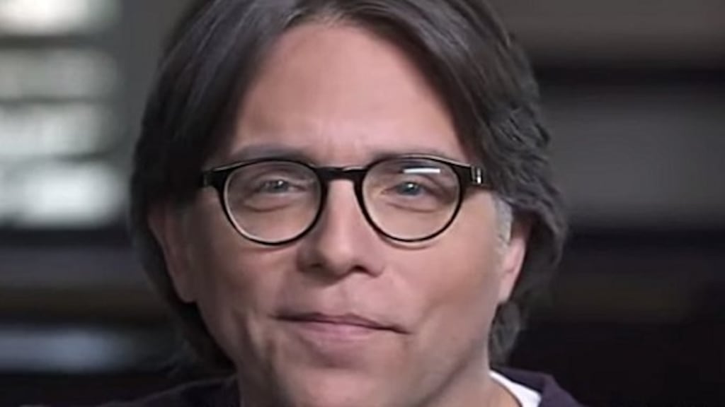 Prosecutors said photographs Keith Raniere kept of one victim were the basis of the child pornography charge.
