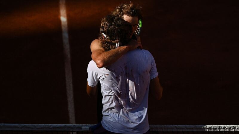 Greece’s Stefanos Tsitsipas hugs Germany’s Alexander Zverev after after winning their French Open semi-final at Roland Garros. Photograph: Christophe Archambault/AFP via Getty Images