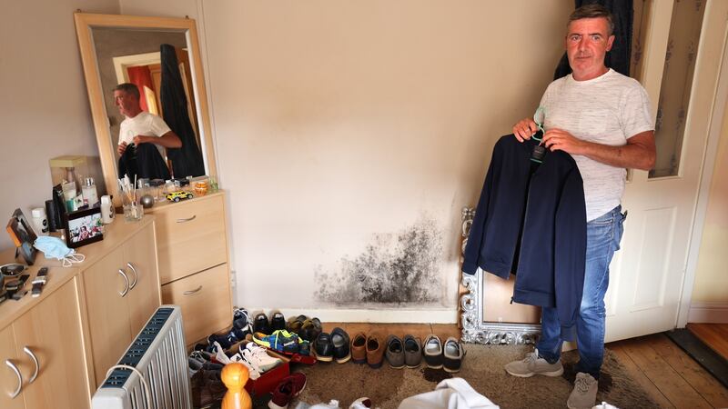 Michael Conway a resident of Oliver Bond House, with some mould on wall of his bedroom, pictured as residents launched a new campaign called “We’re Sick Waiting – A Campaign for Better Housing Conditions”. Photograph: Dara Mac Dónaill