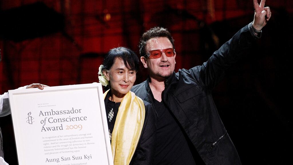 Aung San Suu Kyi receiving Amnesty International’s Ambassador of Conscience Award from Bono at the Bord Gáis Theatre in Dublin in 2012. File photograph: Julien Behal/PA Wire