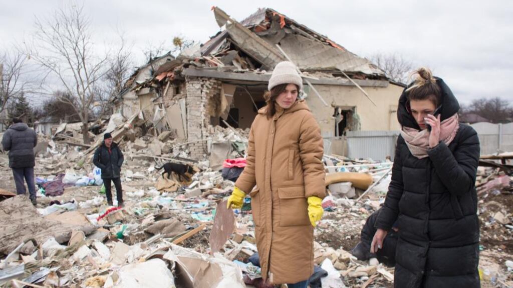 The rubble of a house in Markhalivka: Irish skies are effectively protected by the UK, a country outside the EU. Our coastline is vulnerable and our health service was crippled by a cyberattack last year. Photograph: Anastasia Vlasova