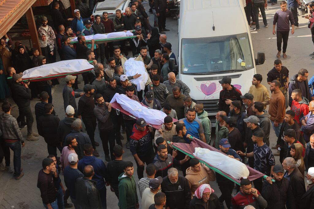 The bodies of victims killed in overnight Israeli air strikes on the Gaza Strip at Al-Ahli Arab hospital, also known as the Baptist hospital, in Gaza City ahead of their burial. Photograph: Omar Al-Qattaa/AFP via Getty Images