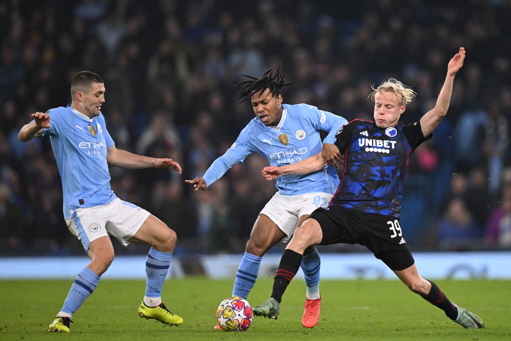 FC Copenhagen's Danish midfielder Oscar Højlund vies with Manchester City's Croatian midfielder Mateo Kovacic and Manchester City's English midfielder Micah Hamilton. Photograph: Oli Scarff/AFP via Getty Images