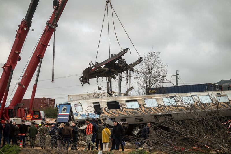 A crane clears wreckage at the crash site on Wednesday. Photograph: Angelos Tzortzinis/New York Times