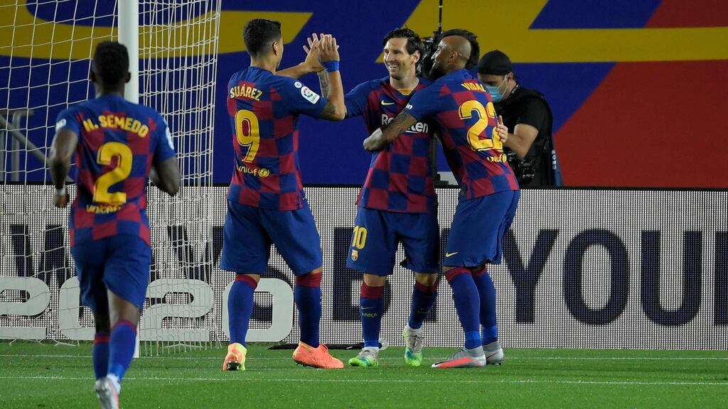 Lionel Messi celebrates with his Barcelona teammates after after the Catalans beat CD Leganes on Tuesday. Photograph: Getty Images