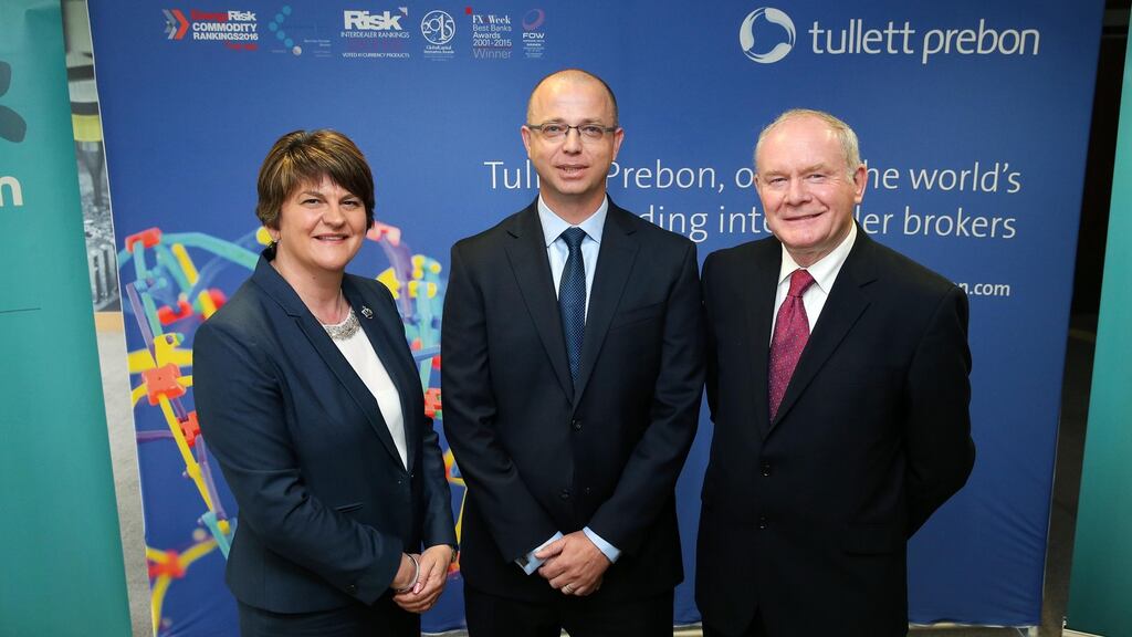 First Ministe Arlene Foster and deputy First Minister Martin McGuinness with Tullett Prebon’s Luke Barnett. Tullett Prebon will receive more than £2 million from Invest NI and £400,000 from the Department for the Economy to support the investment project.