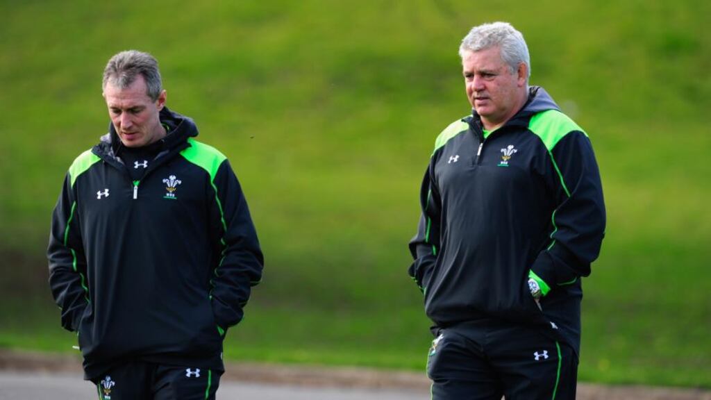 Wales coaches Robert Howley and Warren Gatland chat ahead of their Six Nations encounter against Italy in Rome. Photograph: Getty Images