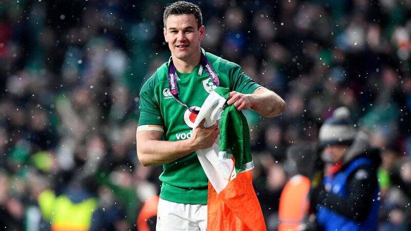 Ireland’s Johnny Sexton celebrates beating England and winning the Glad Slam at Twickenham. Photograph: EPA