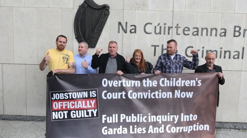 Defendants Paul Kiernan, Keith Preston, Declan Kane, Antoinette Kane, Tommy Kelly and Peter Herbert outside Dublin Circuit Criminal Court after they were all found not guilty on charges of false imprisonment of then-tánaiste Joan Burton at a water charges protest in Jobstown in 2014. Photograph: Collins Courts