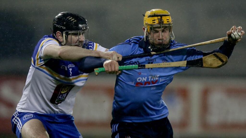 Dublin’s Eamonn Dillon with Brian Carey of DIT during the  Walsh Cup clash at Parnell Park. Photo: Donall Farmer/Inpho