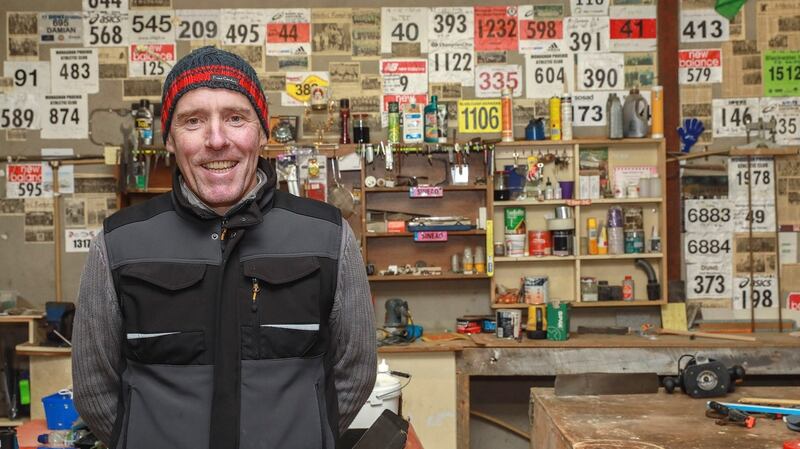 “It’s a bit of a mess. I can’t wait to get home again.” Damien Martin, whose home is across the road from Magheracloone GAA pitch and community centre, in his workshop. Photograph: Pat Byrne