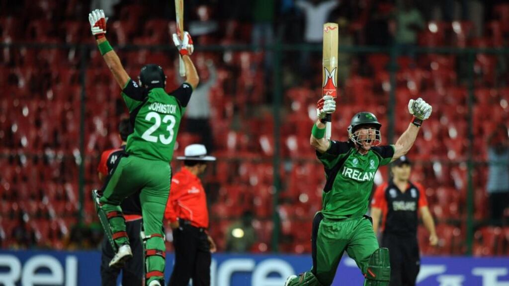 John Mooney (right) celebrates after hitting the winning runs against England at the 2011 World Cup in Bangalore, India. Photograph: Indranil Mukherjee/AFP/Getty Images