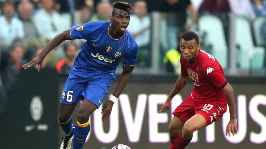 Juventus’ French midfielder Paul Pogba fights for the ball with Cagliari’s Brazilian forward Joao Pedro during the Serie A match at Juventus Stadium. Photo: Marco Bertorello/AFP/Getty Images