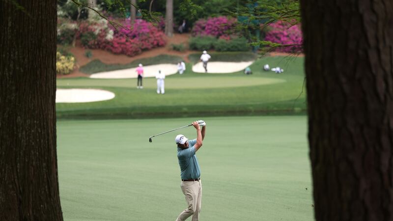Marc Leishman hits his second to the 13th. Photo: Justin Lane/EPA