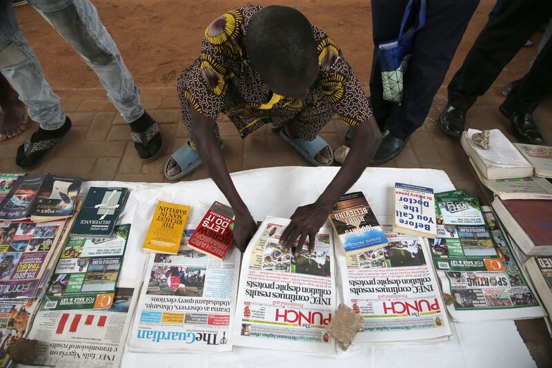 A newspaper stand in the Ikeja district of Lagos, Nigeria. The election is the most competitive since the end of military rule in 1999. Photograph: Akintunde Akinleye/EPA