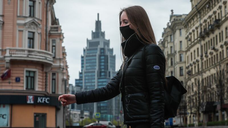 A woman in downtown Moscow on Monday. Photograph: Yuri Kochetkov/EPA