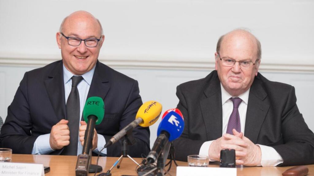French minister for finance Michael Sapi and Minister for Finance Michael Noonan after their meeting at the Department of Finance in Dublin yesterday. Photograph: Leon Farrell/Photocall Ireland.