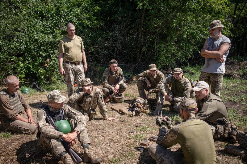 Ukrainian marines training to spot and disarm mines and booby traps in southeast Ukraine. Photograph: Diego Ibarra Sanchez/The New York Times)