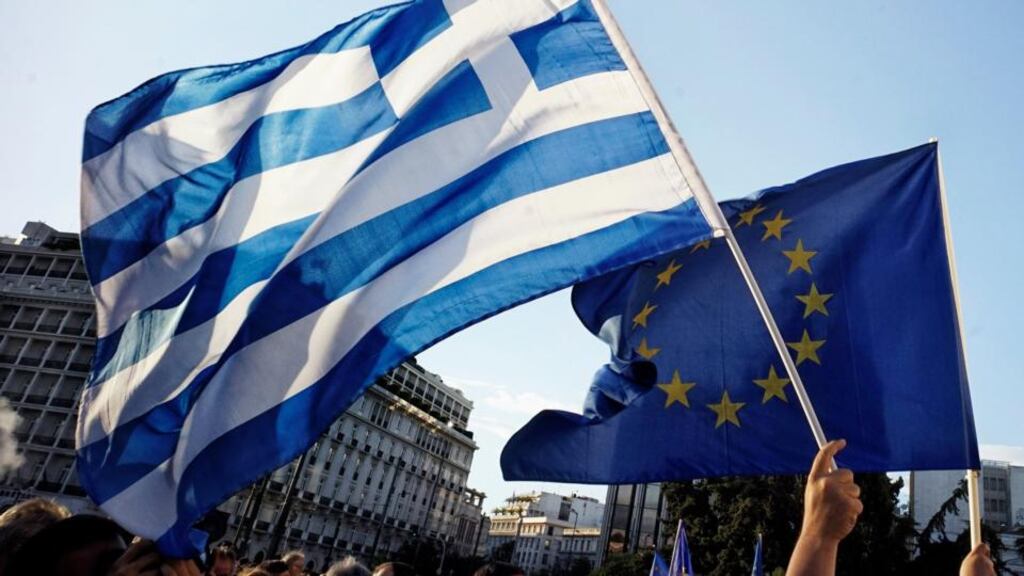 Pro-Euro protesters take part in a rally in front of the parliament in Athens. Photograph: Milos Bicanski/Getty