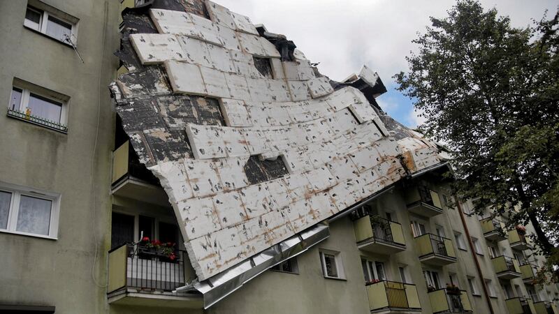 A roof destroyed by a storm hangs from an apartment building in Bydgoszcz, Poland on Saturday. Photograph: Grazyna Marks/Reuters