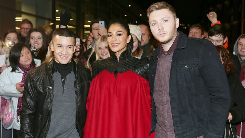 X Factor finalists Jahmene Douglas and James Arthur with X Factor judge Nicole Scherzinger in December 2012. Photograph: Dave Thompson/PA Wire