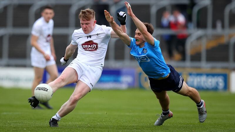 Dublin’s Kieran Conroy and Adam Fanning of Kildare during Thursday’s Leinster Under-20 final in Portlaoise. Photograph: Ryan Byrne/Inpho