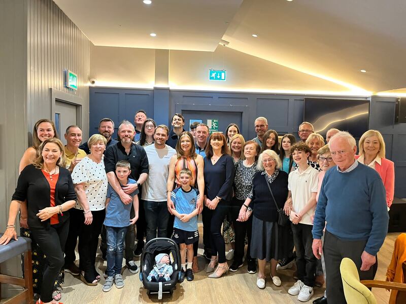 Antoine Frisch with the extended Healy family at a reunion in Thomas Davis's GAA club in Tallaght