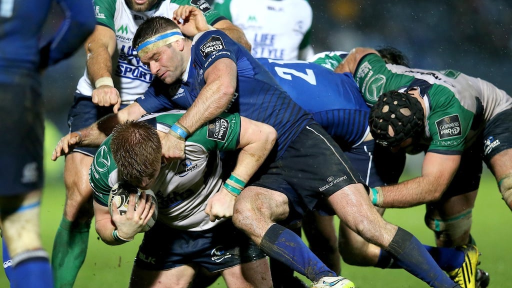 Leinster’s Fergus McFadden tackles Sean O’Brien of Connacht during their Pro12 encounter. Photo: Ryan Byrne/Inpho