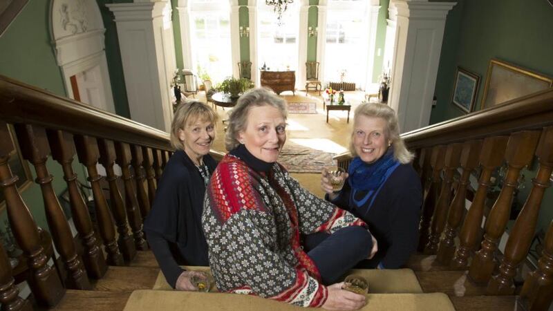 The Jameson sisters on the staircase at Tourin House. Photograph: Patrick Browne