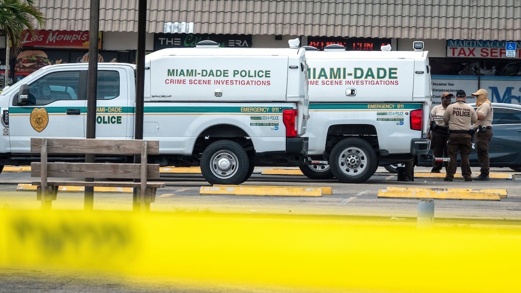 Miami Dade Crime Scene Investigators work at the scene of a shooting, at the entrance of the Billiards banquet hall in Miami Gardens, Florida on May 30th. Photograph: Cristobal Herrera-Ulashkevich/EPA