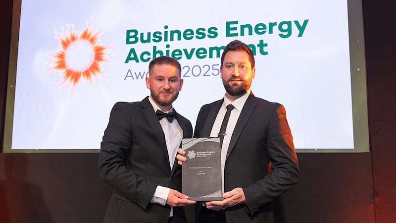 Adam Kane, community lead at BusinessRiver, presents the overall energy achievement award to Colin O'Brien, Croke Park