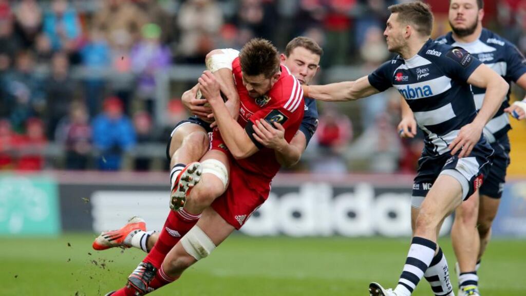 Munster’s Dave Foley is tackled by Mark Jennings of Sale during the Champions Cup match at Thomond Park. Photograph: Ryan Byrne/Inpho.