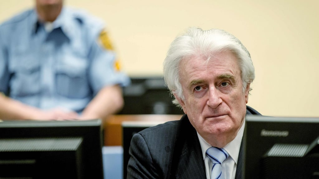 Bosnian Serb wartime leader Radovan Karadzic sits in the courtroom at the International Criminal Tribunal for Former Yugoslavia in The Hague, on Thursday. Photograph: AFP/Getty