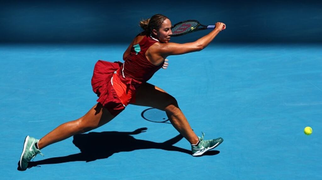 Madison Keys of United States plays a backhand during her victory over Jaqueline Cristian of Romania. Photograph:  Clive Brunskill/Getty Images