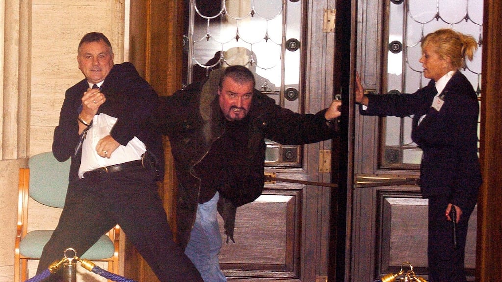Michael Stone was tackled by security officers as he entered Stormont in 2006. Photograph: Arthur Allison/Pacemaker
