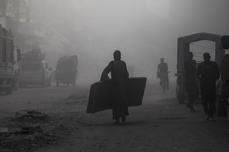 Palestinians evacuate an area targeted by an Israeli airstrike in Gaza City, September 21st. Photograph: Mohammed Saber/ EPA