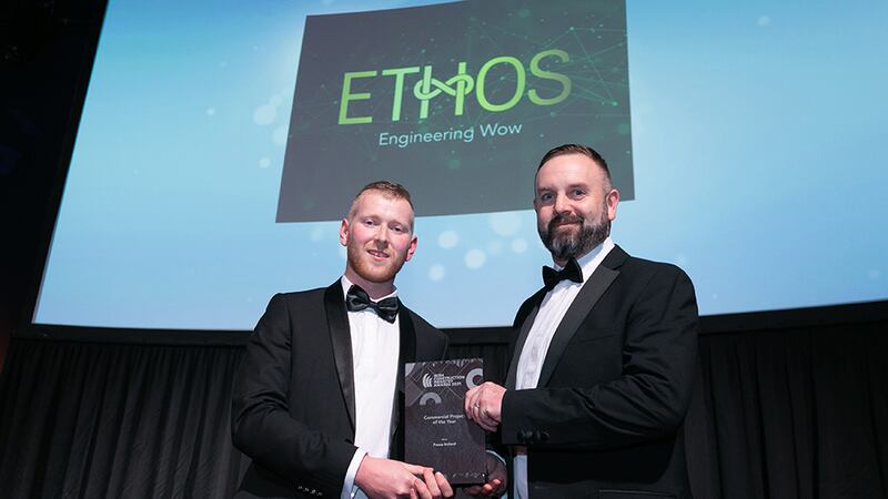 Neil Wall, Head of Entries, BusinessRiver, presents the Commercial Project of the Year award to Paul Tighe, Ethos Engineering.
