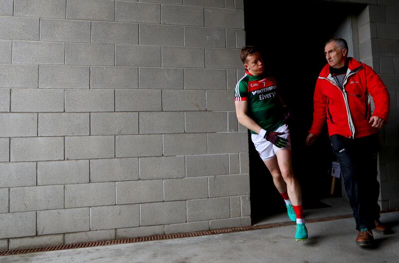 Mayo's Donal Vaughan and selector Donie Buckley take to the field during the 2017 season. Photograph: James Crombie/Inpho