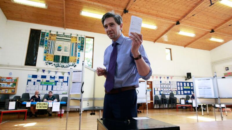 Minister for Health Simon Harris votes at his local polling station in Delgany, Co Wicklow. Photograph: Nick Bradshaw