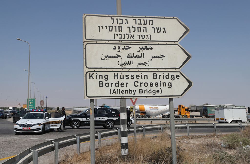 Israeli security forces stand near the site after a truck driver shot three Israelis dead at Allenby Bridge, also known as the King Hussein Bridge, crossing between Jordan and the West Bank, near Jericho. Photograph: Jawal Awwad/EPA